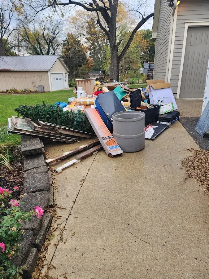 Dumpster being loaded with debris for Demolition Dumpster Rental in Pennsville